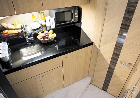 Galley is prepared installation space and storage place for cooking utensils. Table color is an example.