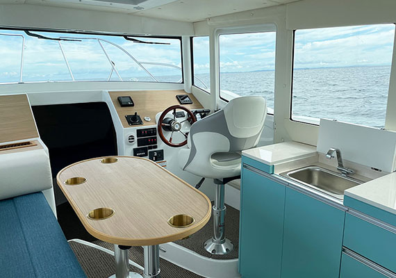 Lower station (opt), galley (opt), cabin swivel seat (opt).Only salon table (opt) is standard for X specification.