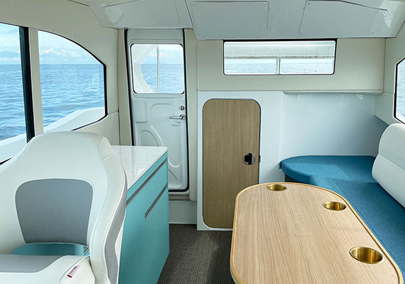 Lower station (opt), galley (opt), cabin swivel seat (opt).Only salon table (opt) is standard for X specification.