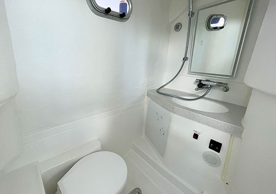 Ample size powder room with hot shower (opt).